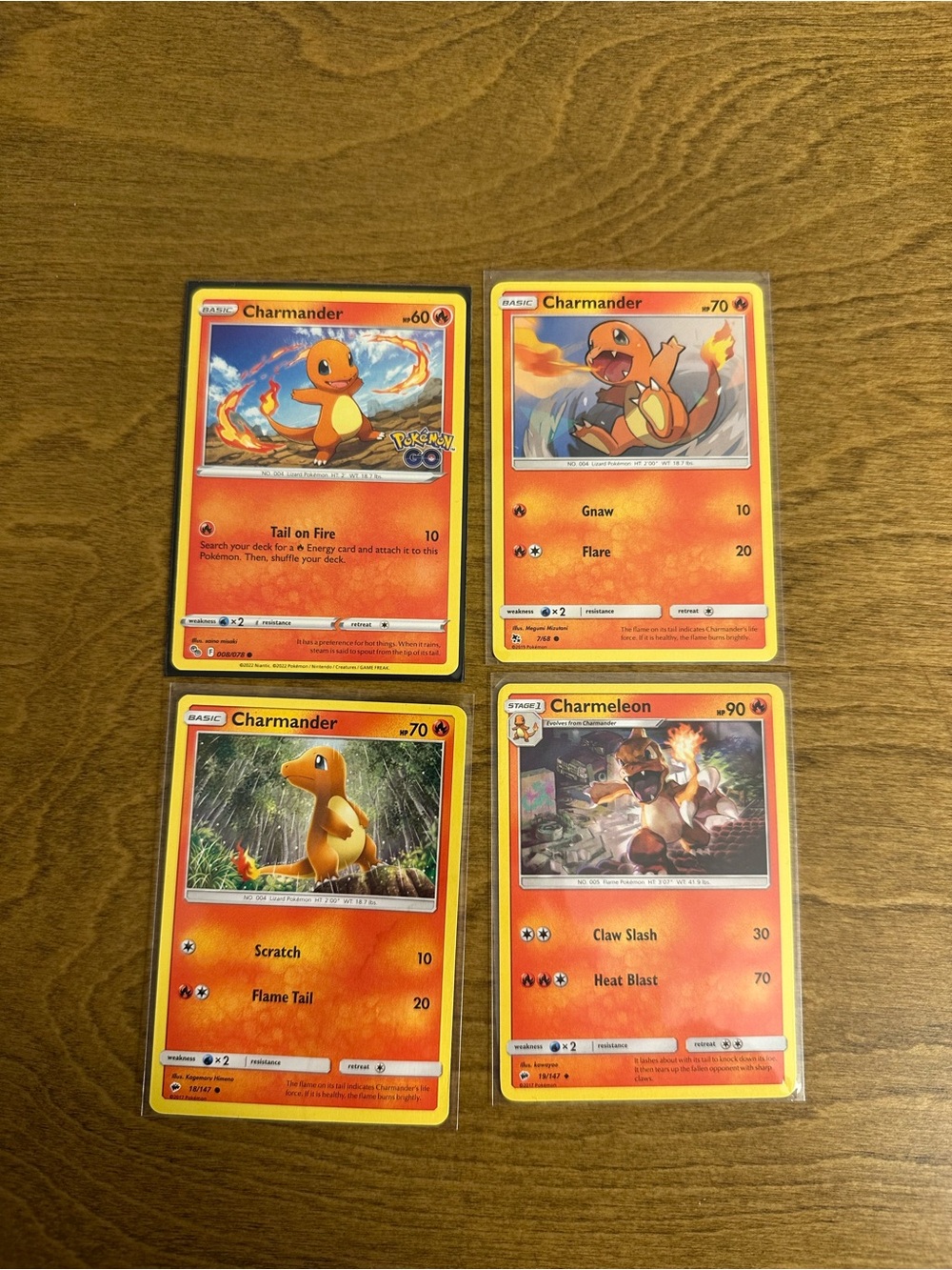 Lot of 4 Charmander and Charmeleon Pokemon Cards NM